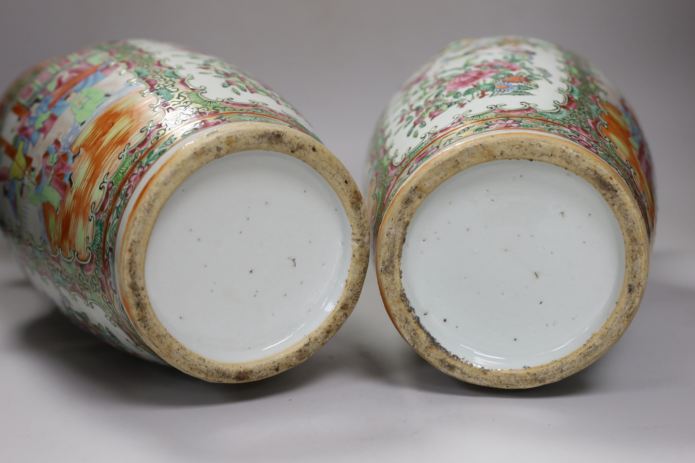 A pair of 19th century Chinese famille rose two handled vases, 36cm